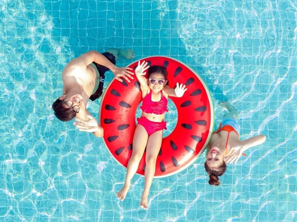 Aerial view of poolside family having fun at Paradox Singapore