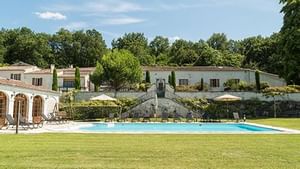 Distant view of outdoor pool at Le Relais de Saint-Preuil