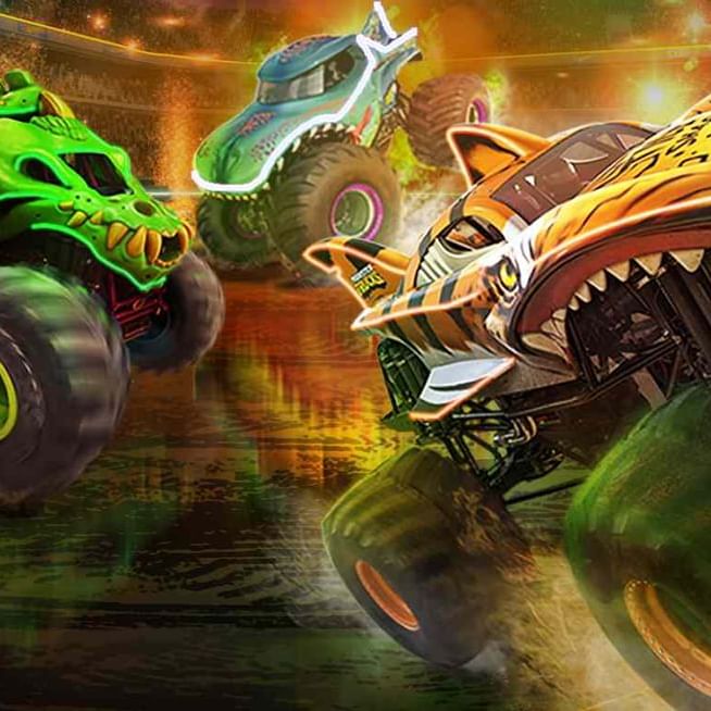 Hot Wheels Monster Trucks launching off ramps in a glowing arena with bright lights and fire effects