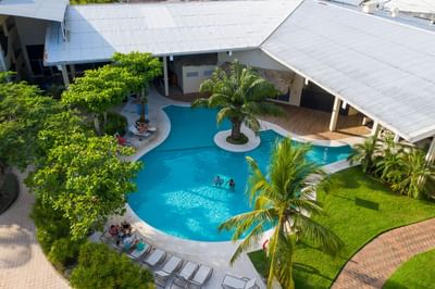 High angle view of outdoor pool with sunbeds at Fiesta Resort