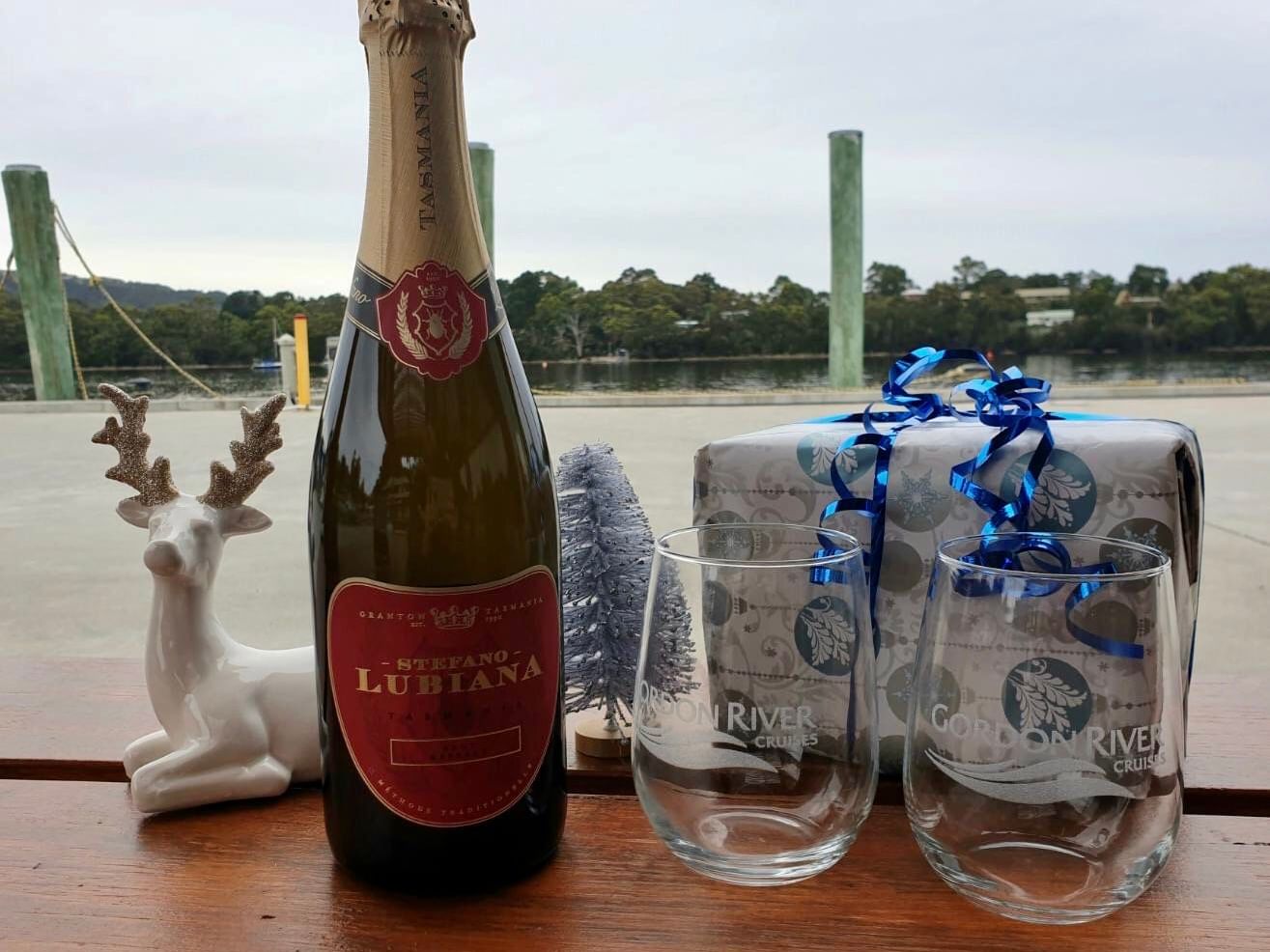 Champagne bottle with two glasses at Gordon River Cruise