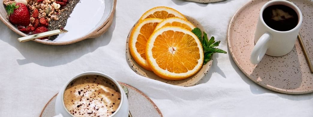 Pancakes, orange & coffee at Novotel Sydney Darling Square