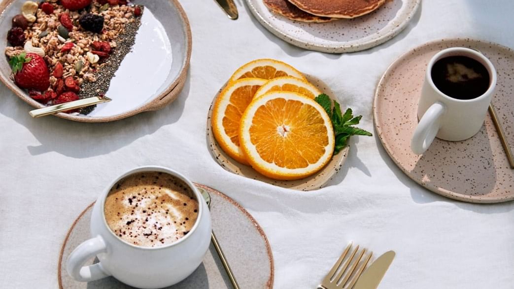 Pancakes, orange & coffee at Novotel Sydney Darling Square