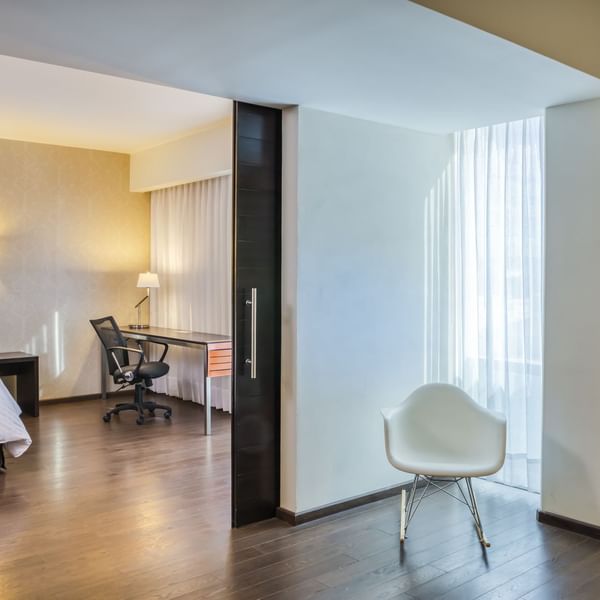Interior of Junior Suite with furniture at Fiesta Inn