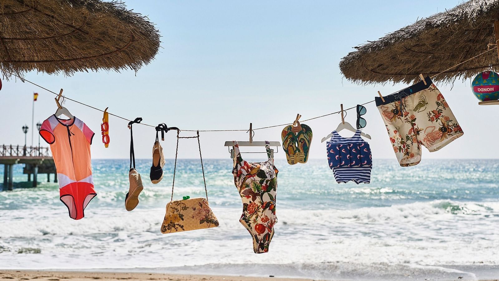 Swimming kits hung on a line near the sea at Marbella Club