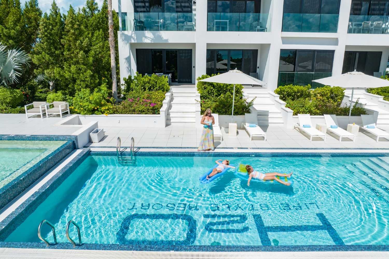 Family by the pool at H2O life.style.resort in Turks and Caicos