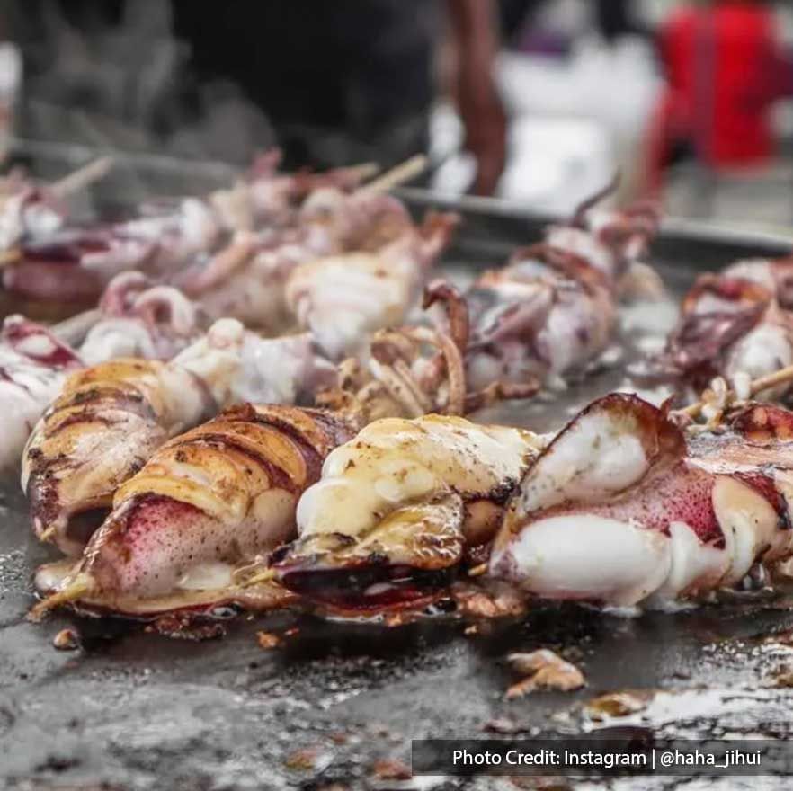 A street food of sizzling squid found in penang international food festival.