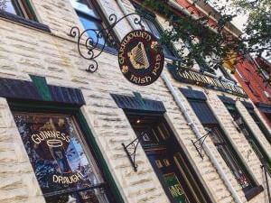 brick building with sign for guiness draught