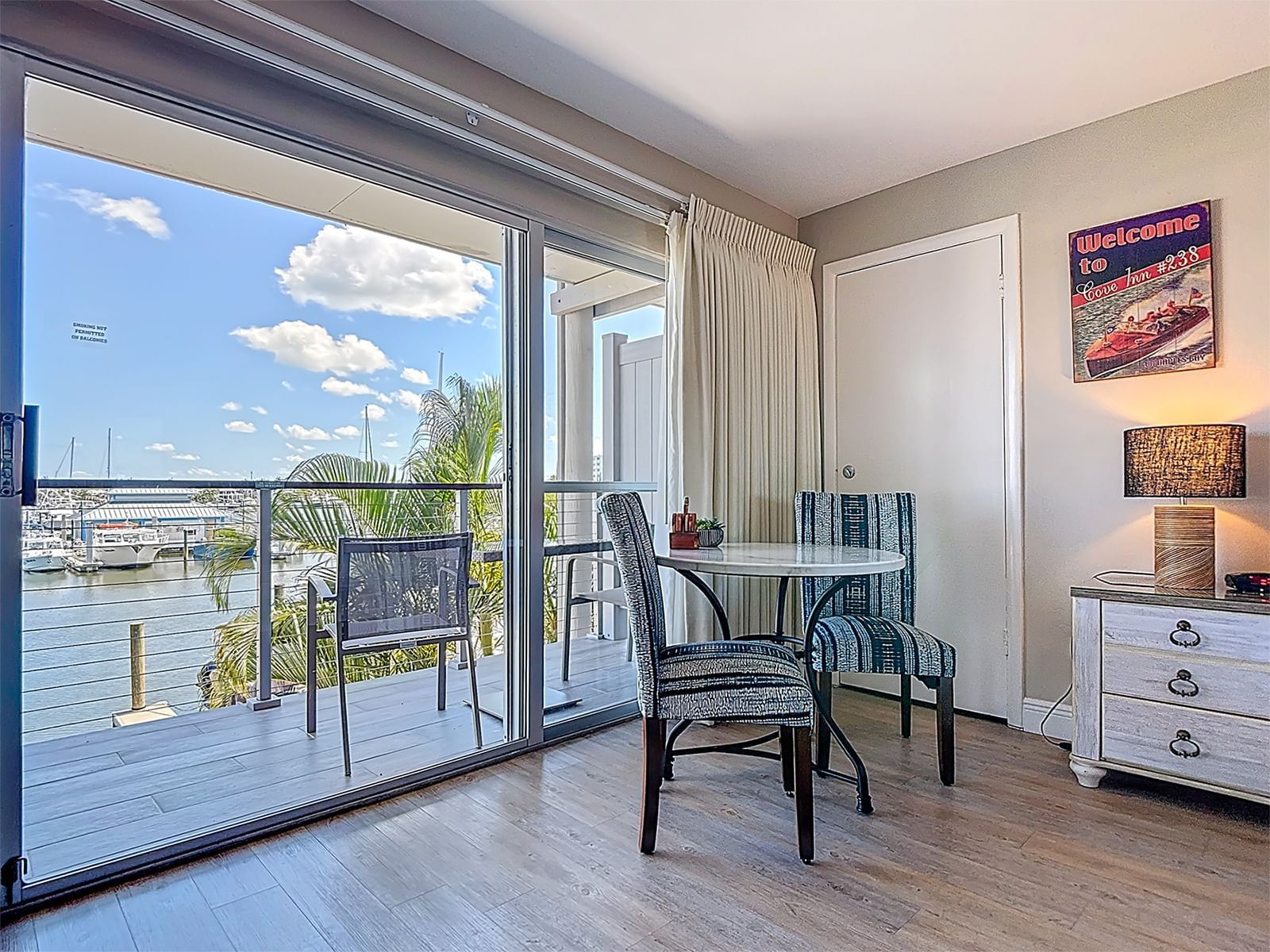 Enjoy the AARP Discount at the Cove Inn Hotel on Naples Bay, Florida.