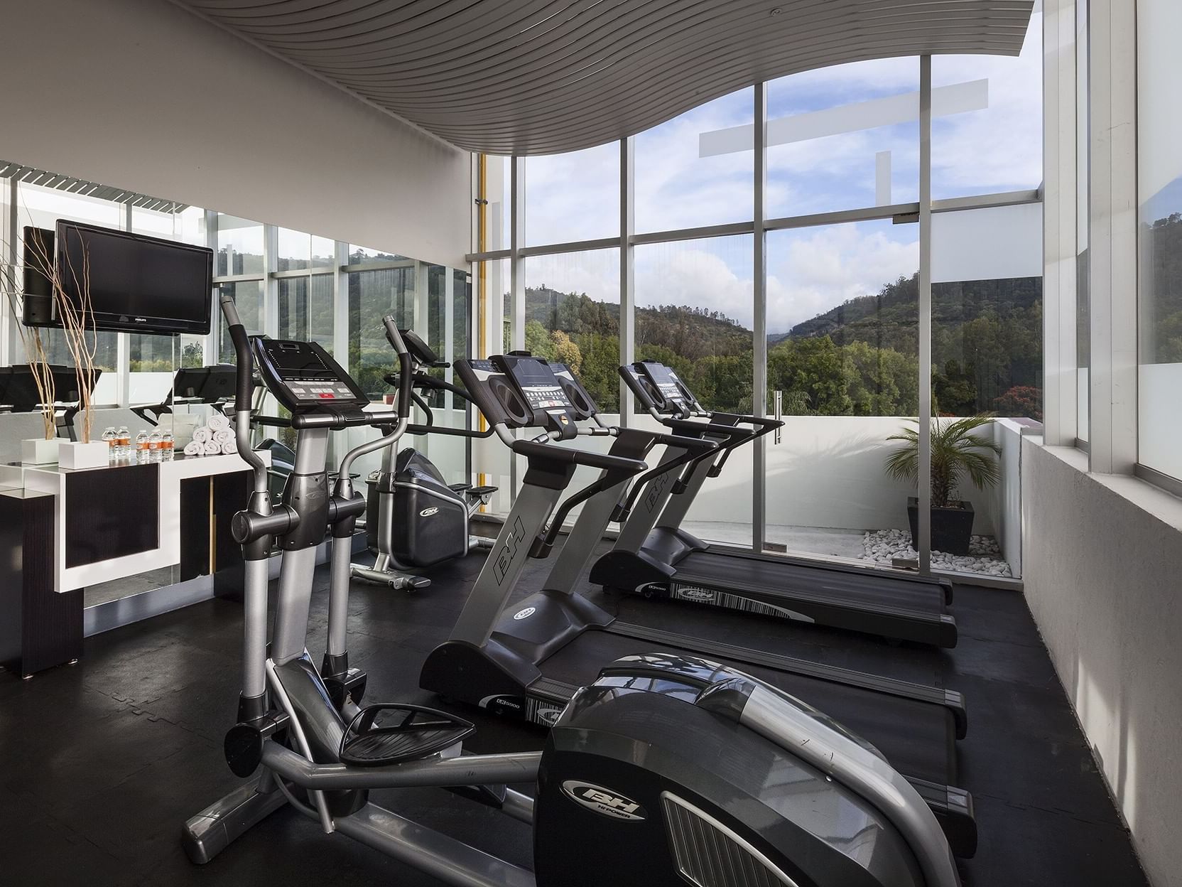 Exercise equipment in the fitness center at Gamma Hotels