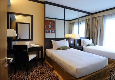 Double bedroom with work desk & vanity mirror at MiCasa All Suite Hotel KL
