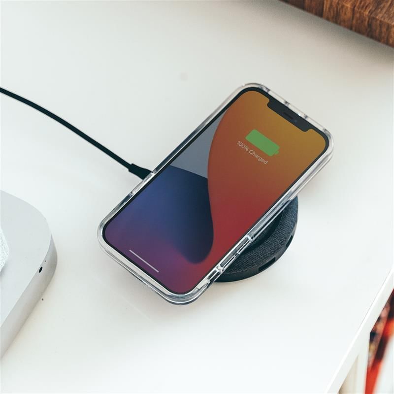 Phone charging on a wireless charger in a room at Pullman Sydney Hyde Park