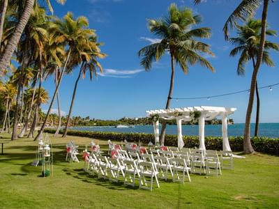 Wedding ceremony arranged near the ocean at Copamarina Weddings