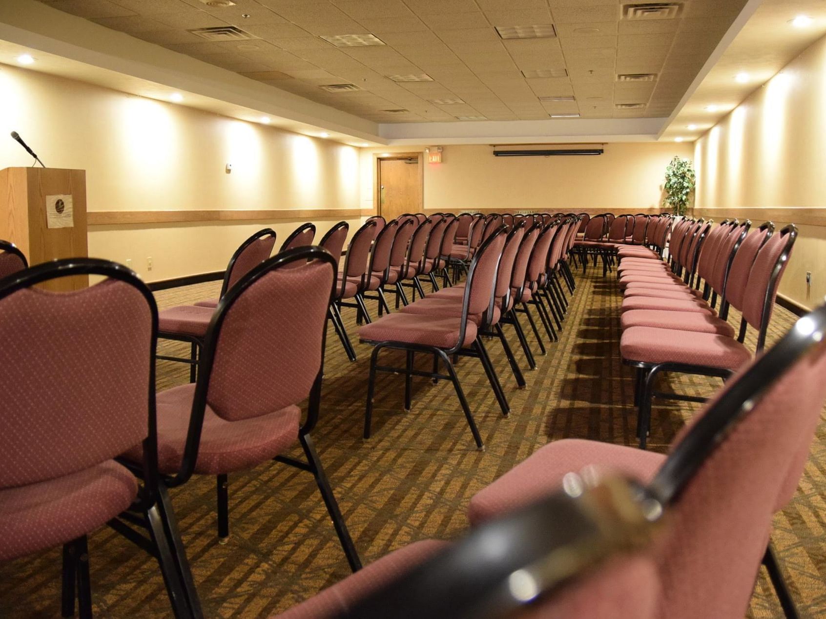 Wexford room arranged with chairs & podium at Evergreen Resort