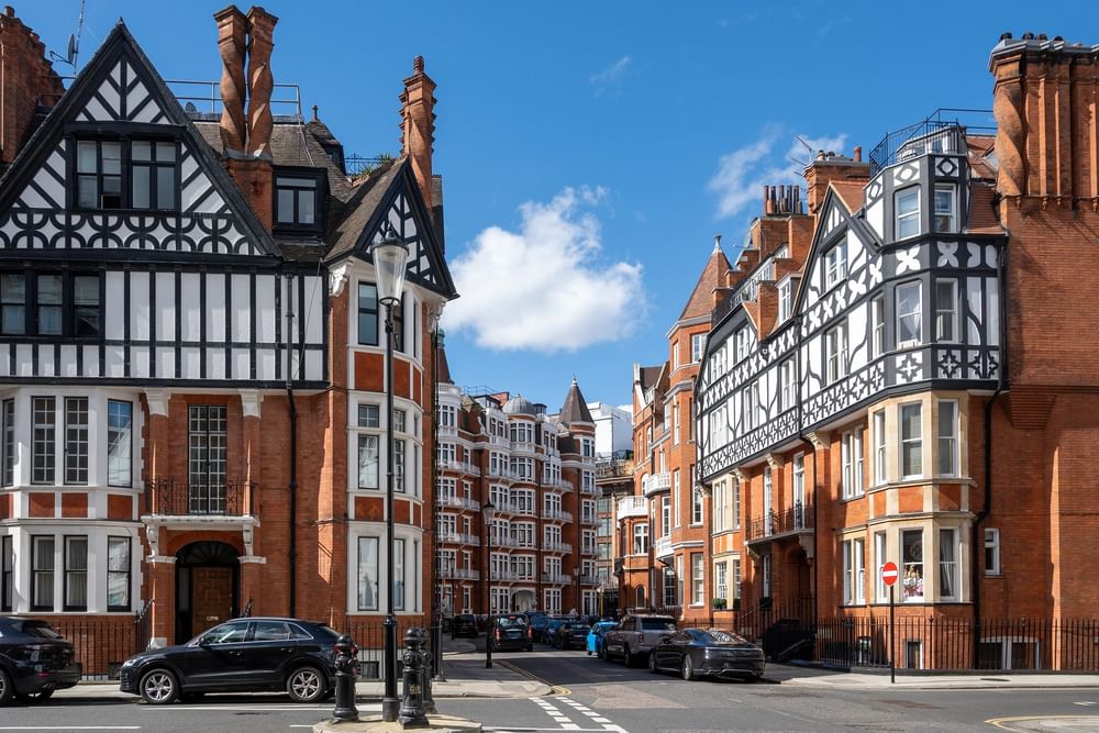 Knightsbridge area with parked cars by brick buildings at The Capital Hotel, Apartments and Townhouse