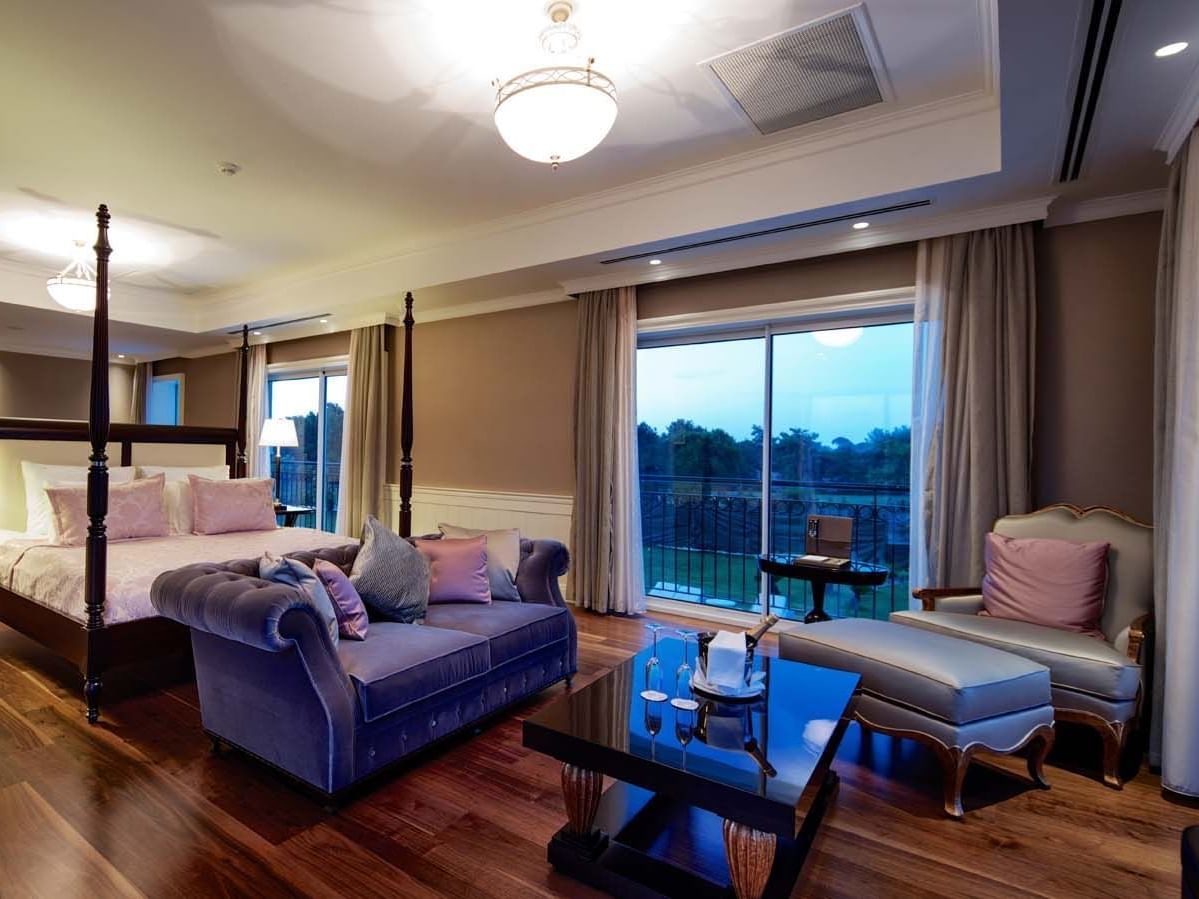 Cozy bed and sitting area in Presidential Villa at Titanic Deluxe Golf Belek
