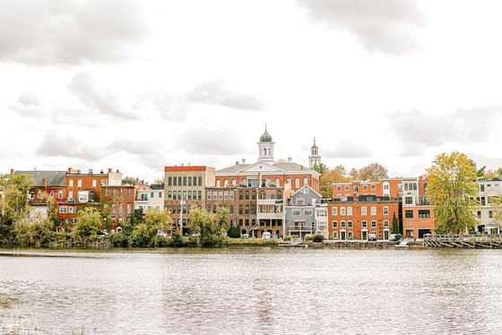 A Distant exterior view of the Hotel & river at The Exeter Inn