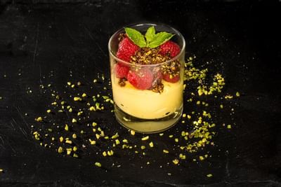 Close up of a served dessert in a restaurant at Uptown Palace