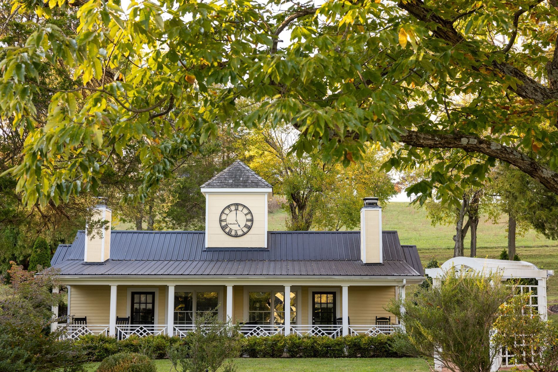 Exterior view of the inn at Willow grove surround with trees