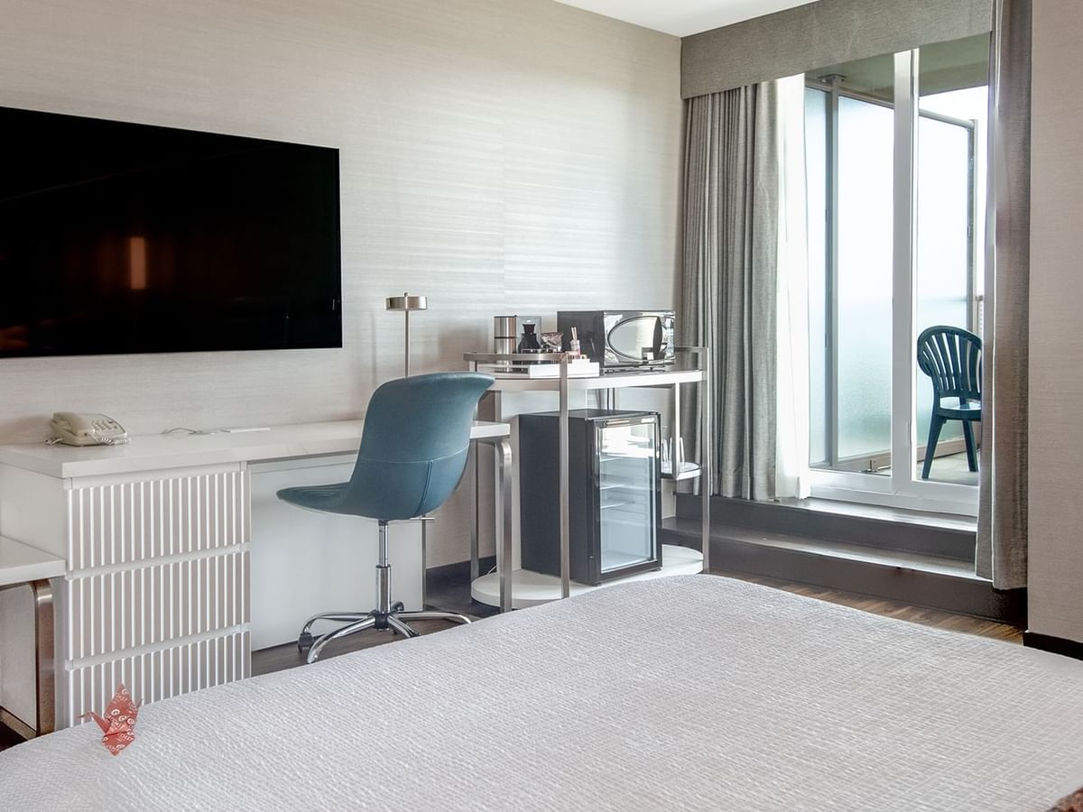 Hotel room with TV and patio