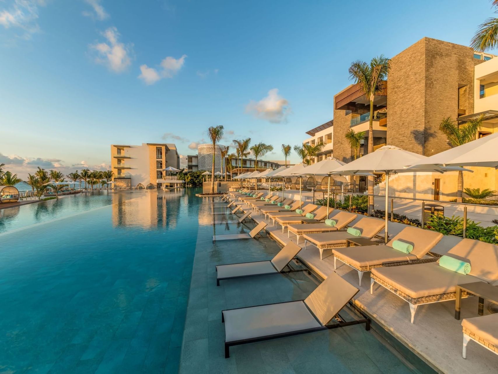 Sunloungers on the deck by the pool at Haven Riviera Cancun