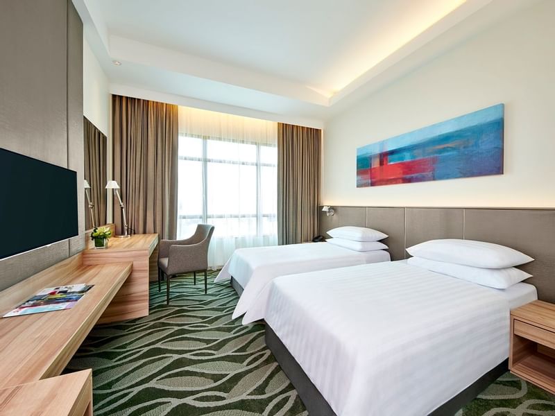 Mini work area with a TV & mirror in Deluxe King at Sunway Hotel Big Box