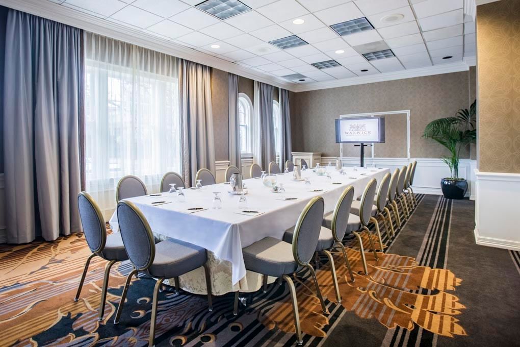 Interior of the boardroom at Warwick Melrose Dallas