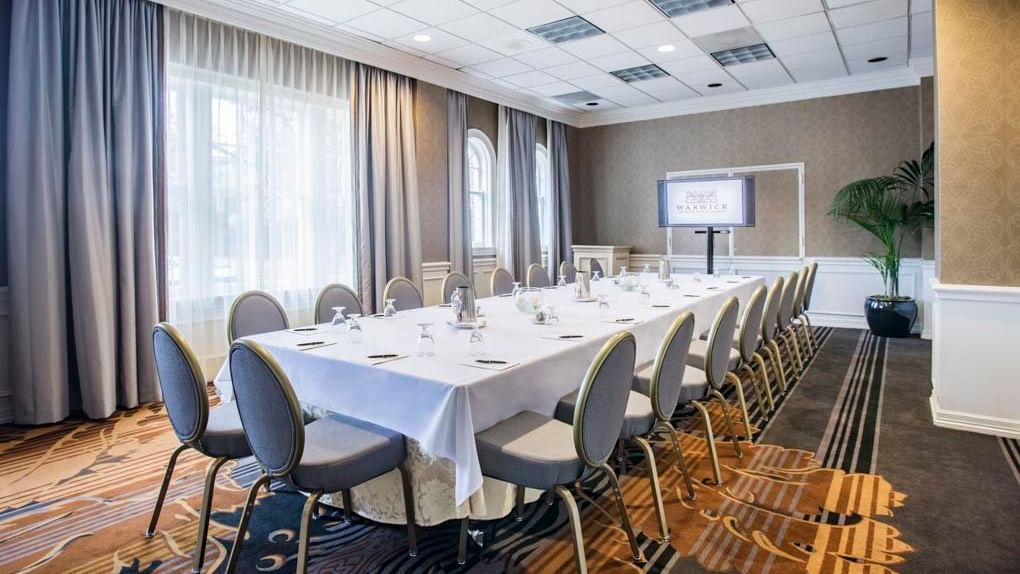 Interior of the boardroom at Warwick Melrose Dallas