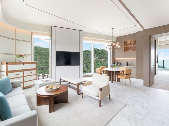 Living area with comfy sofa in Grand Deluxe Oceanfront Balcony Suite at Fullerton Ocean Park Hotel Hong Kong