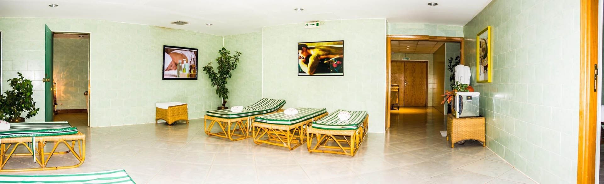 Health Club relaxation area at Pickalbatros Golf Beach Resort, with lounge chairs, and plants for a calm atmosphere