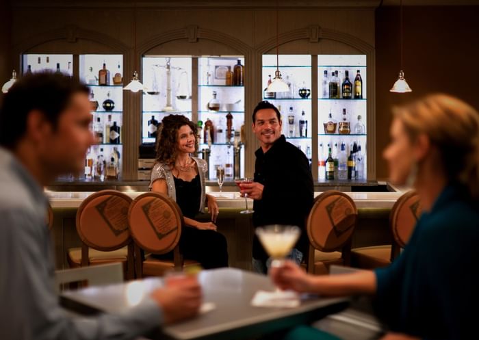 Guests enjoying drinks in Apothecary Lounge, Hotel Parq Central