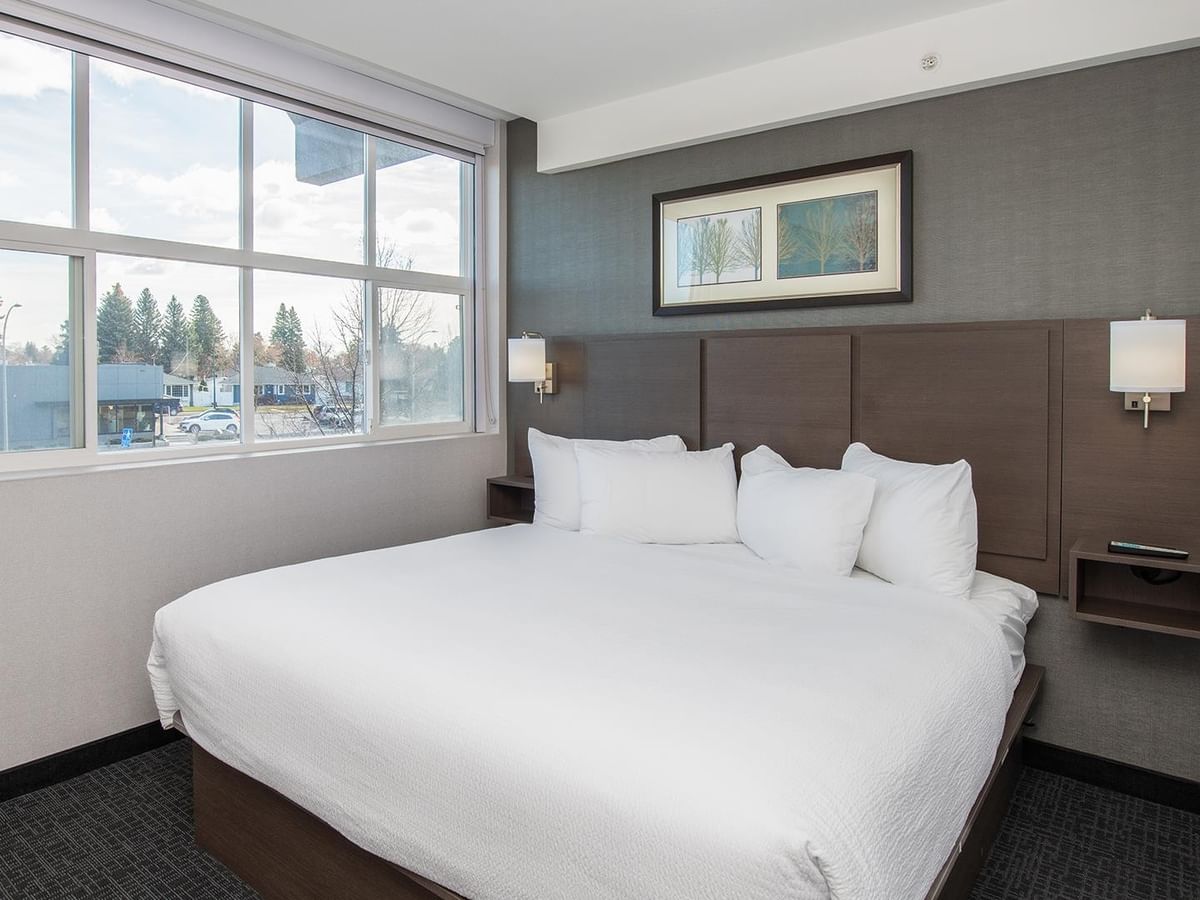 King bed in a hotel suite bedroom.