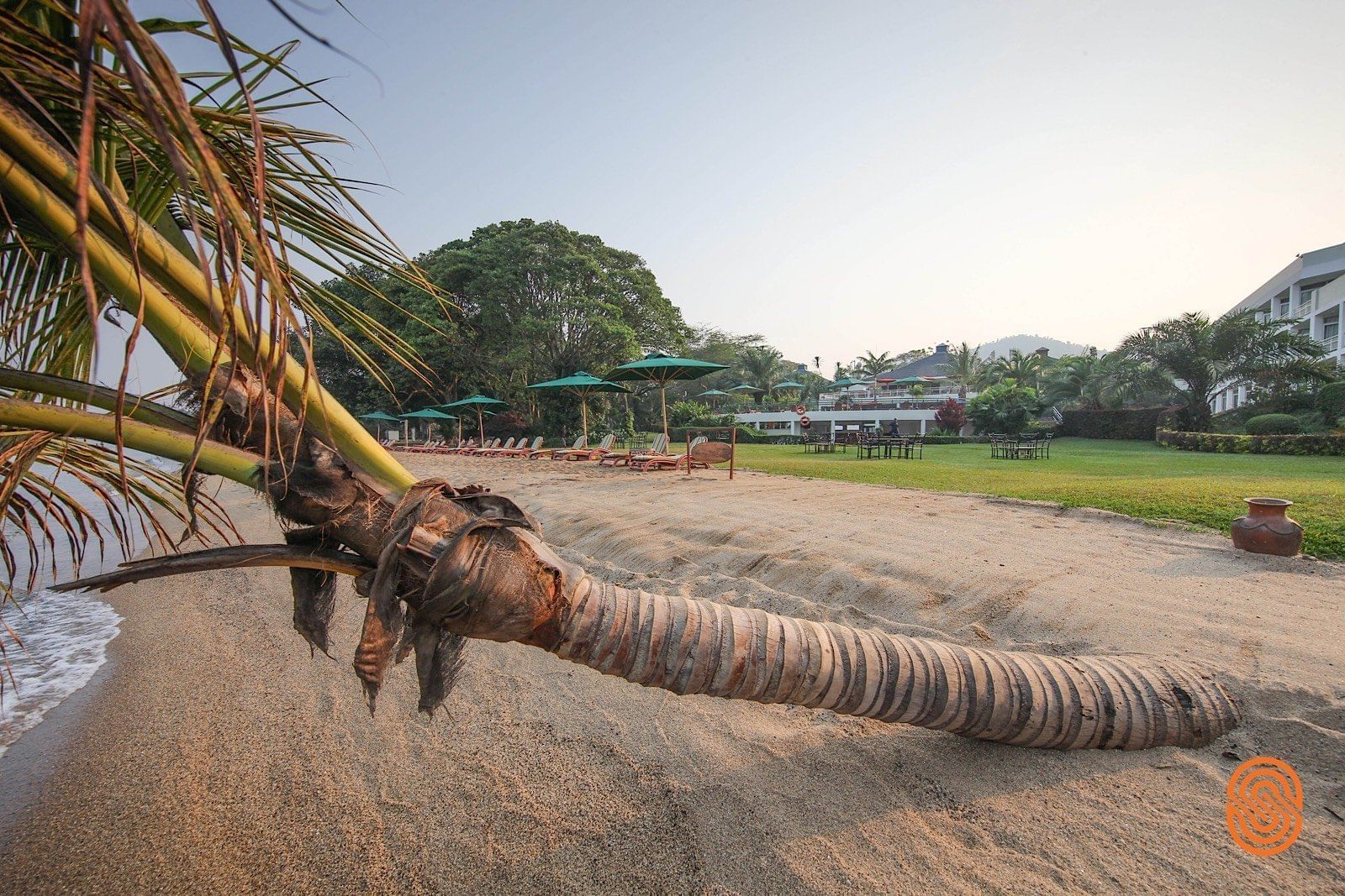 Beach with sunbeds at Lake Kivu Serena Hotel
