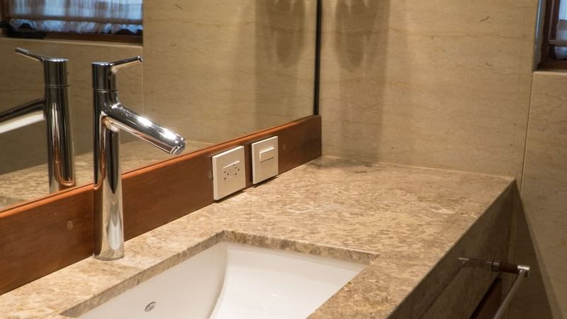 Vanity of a bathroom in a room at Gamma Monterrey Rincón