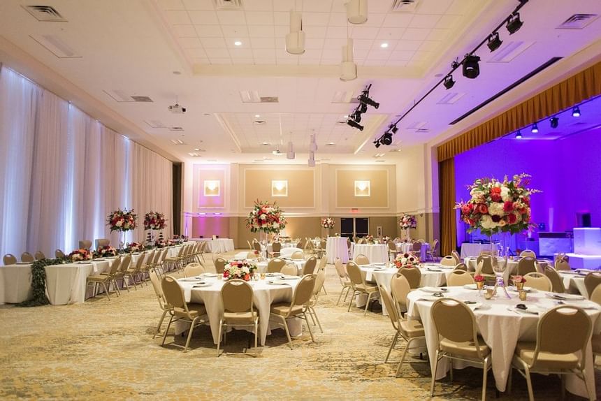 tables and chairs in a large ballroom