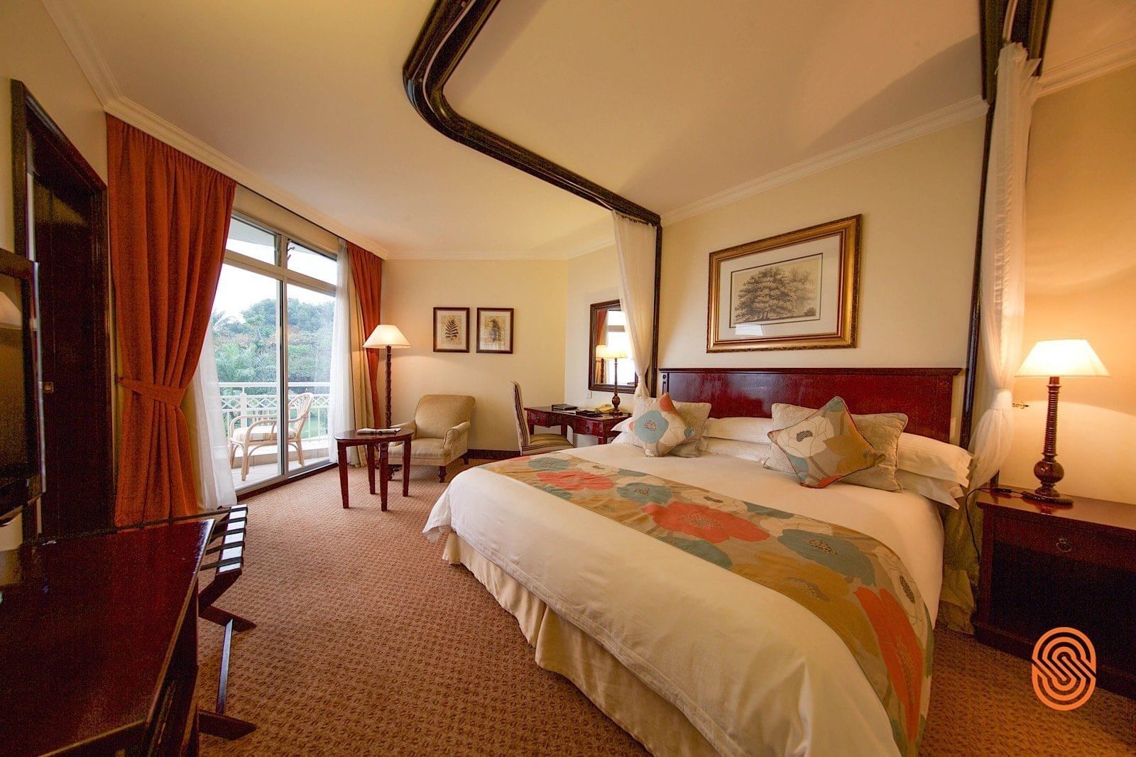 King bed in the Executive Suite at Lake Kivu Serena Hotel