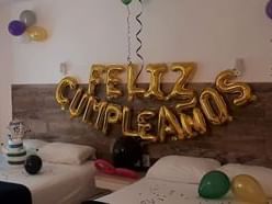 A birthday decoration by the bed at Hotel Villa Varadero