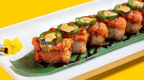 spicy sushi rolls on white tray from Moshi Moshi  in MiMo District, Miami