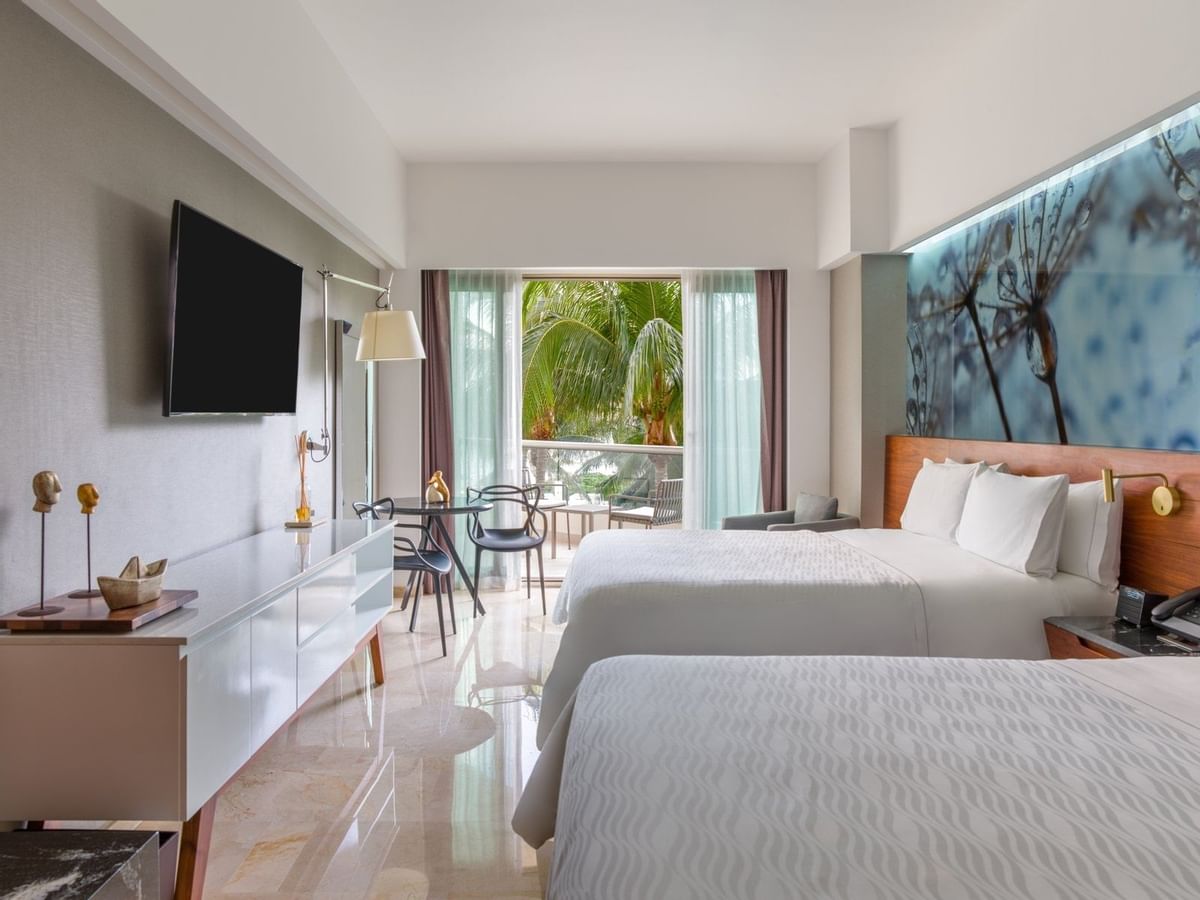 Premium Garden View with double beds, a TV and a balcony overlooking greenery at Live Aqua Beach Resort Cancun