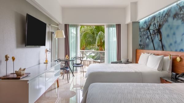 Premium Garden View with twin bed faced TV at Live Aqua Beach Resort Cancun