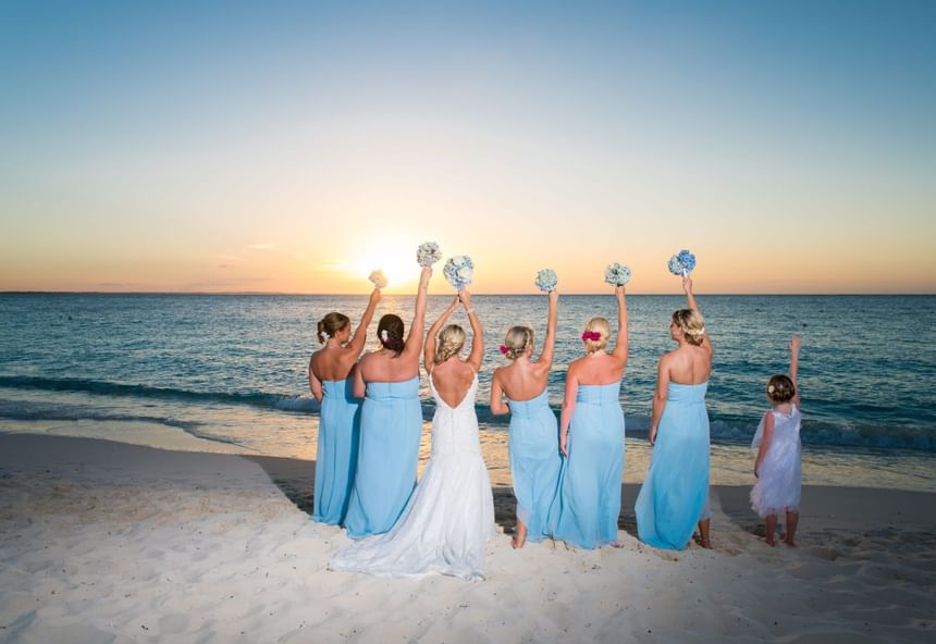 Bride & bridesmaids at the beach near The Somerset On Grace Bay