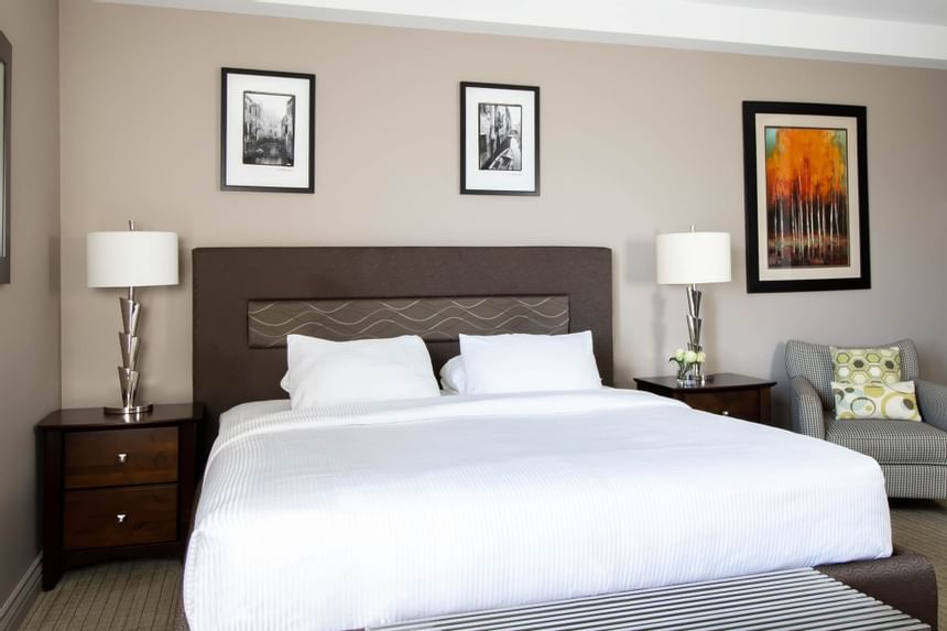 Comfy bed in King Superior Den at  Retro Suites Hotel