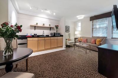 A large kitchen area in a guest room at Artmore Hotel