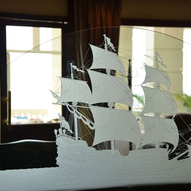 A Sailing ship image on a glass at Polana Serena Hotel