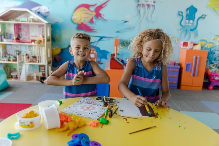 Kids playing with colors in the Kids' Club, The Diplomat Resort