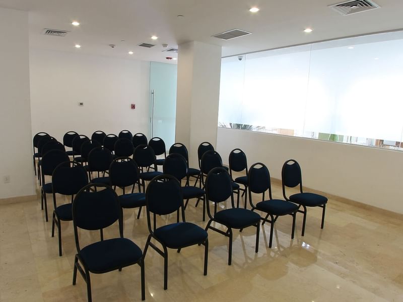 Chair arrangements in a meeting room at One Hotels