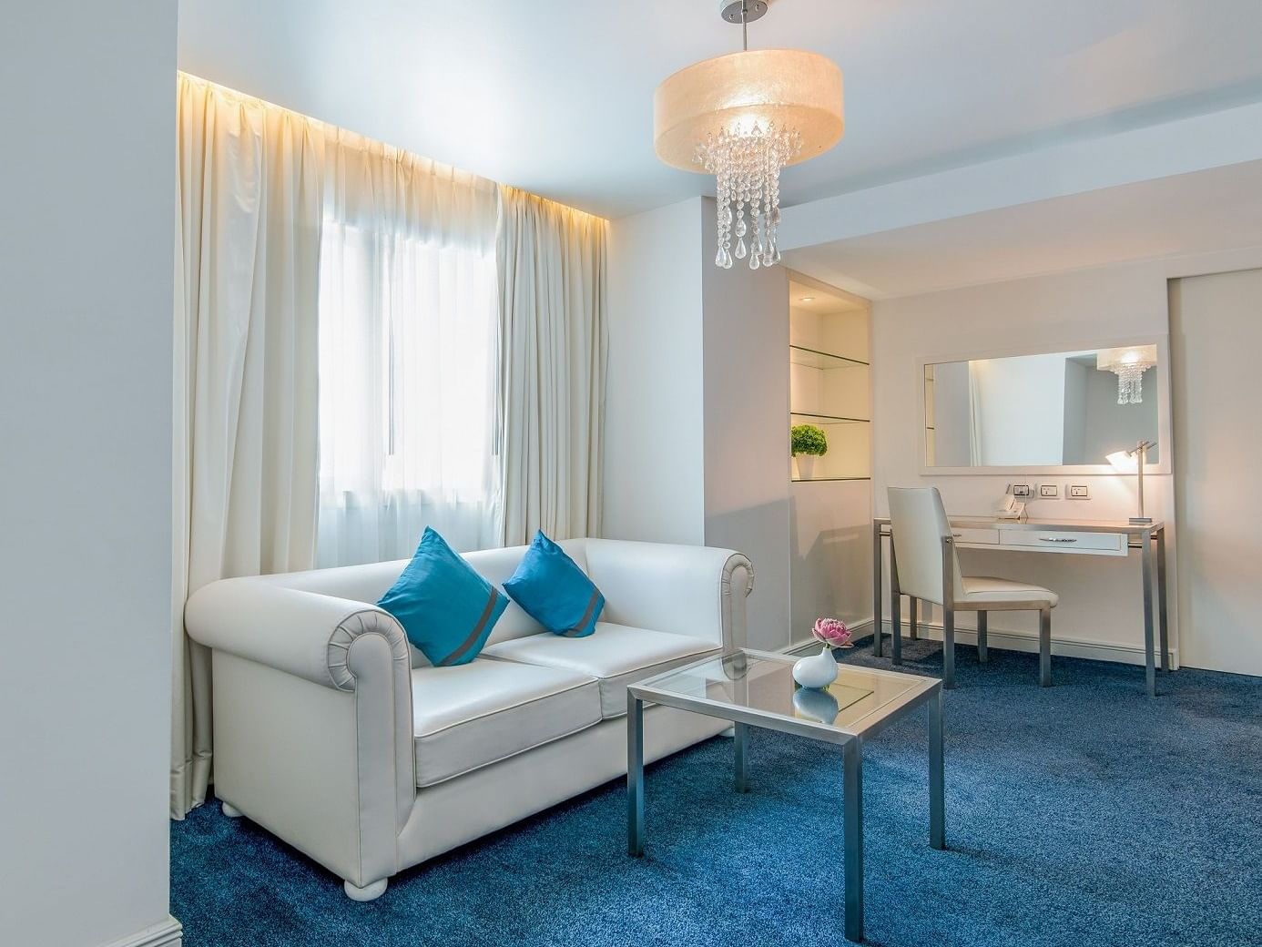 Room with sofa set ,glass table Gold Suite at Dream Bangkok