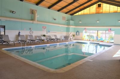 Indoor Pool with deck chairs