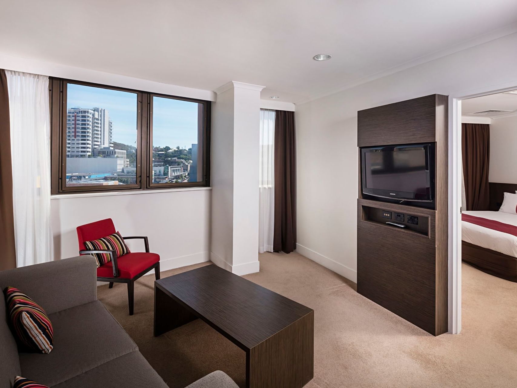 One Bedroom Apartment lounge area at Grand Chancellor Townsville