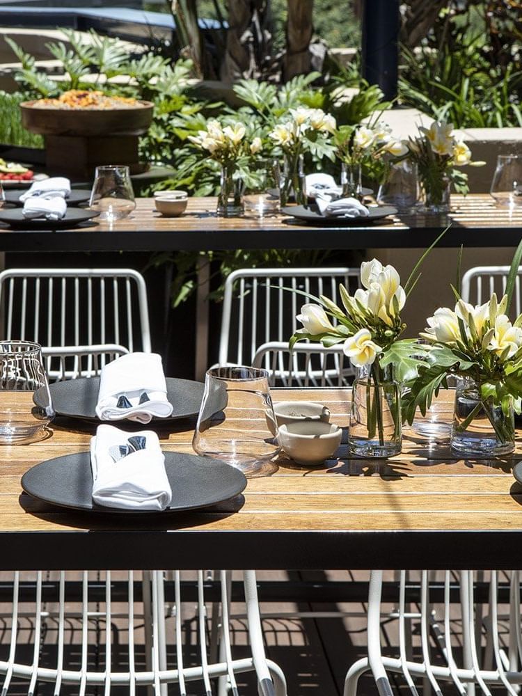 Attractive out door dining area at Sebel Suites Brisbane
